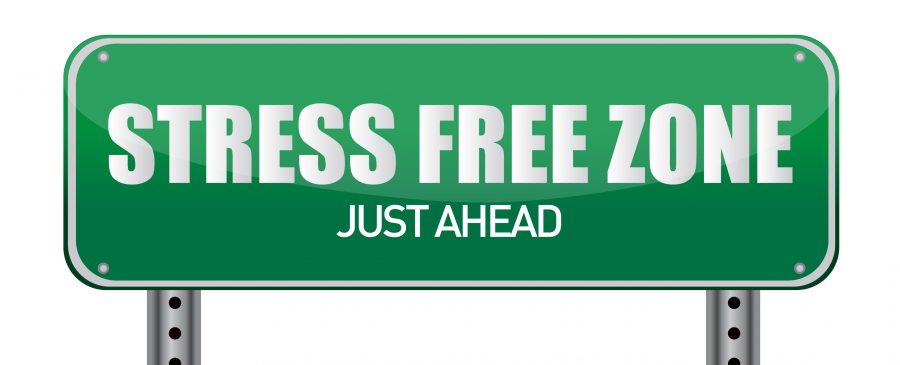 the words stress free zone just ahead on a road sign.