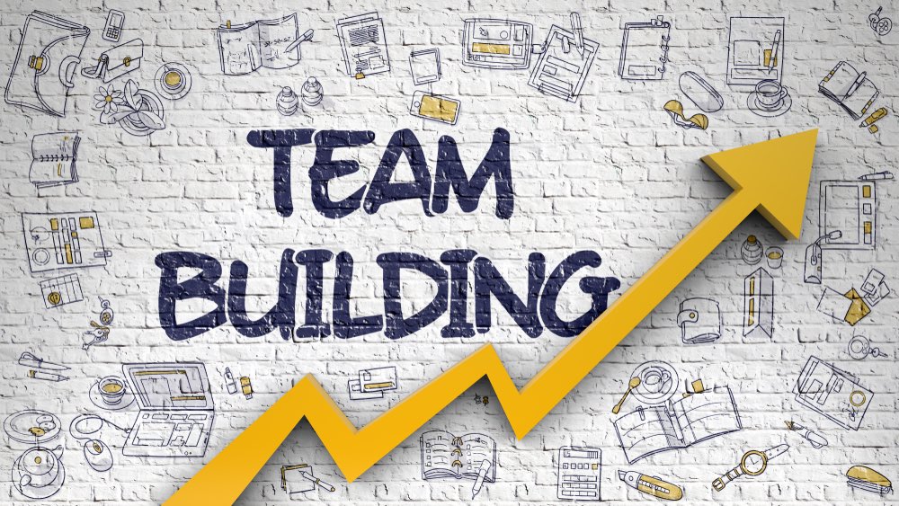 an animated graphic of the word team building with an yellow arrow showing an increase